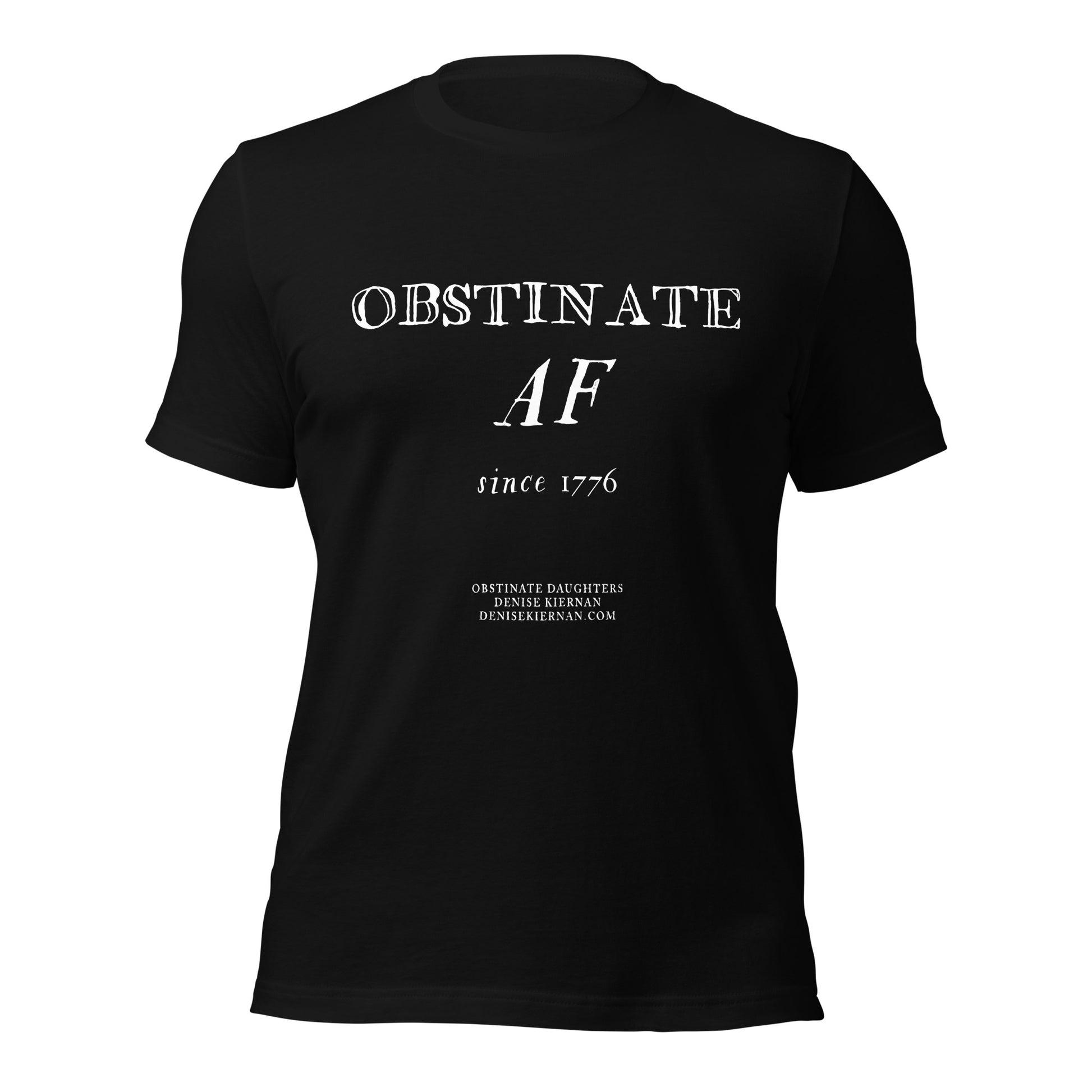 Front view of a soft, unisex cotton t-shirt in black, featuring the bold text 'OBSTINATE DAUGHTER' in vintage-style lettering. Inspired by the nonfiction history book Obstinate Daughters by Denise Kiernan.
